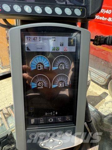 CAT M317 F Pelle sur pneus