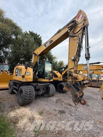 CAT M317 F Pelle sur pneus