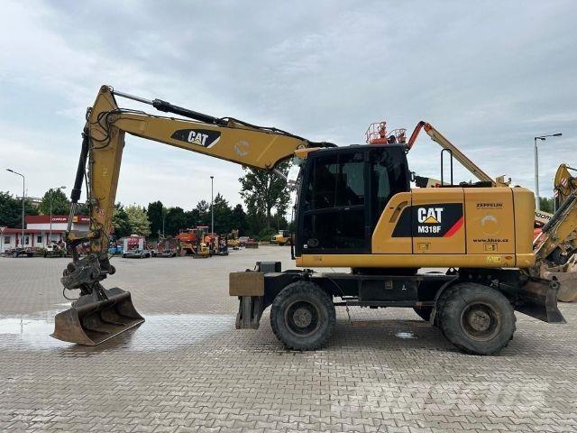 CAT M318F Construction - Autres
