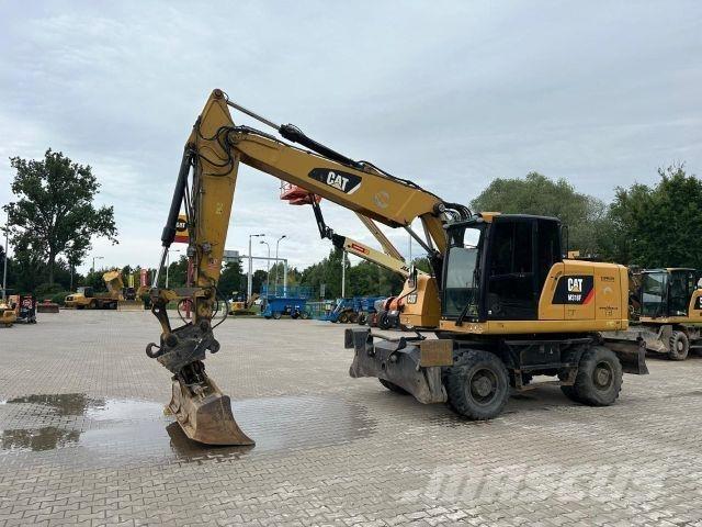 CAT M318F Construction - Autres