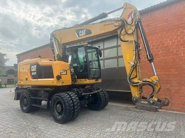 CAT M318F Pelle sur pneus