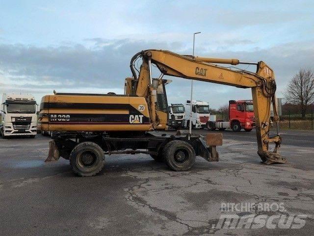 CAT M320 Pelle sur pneus