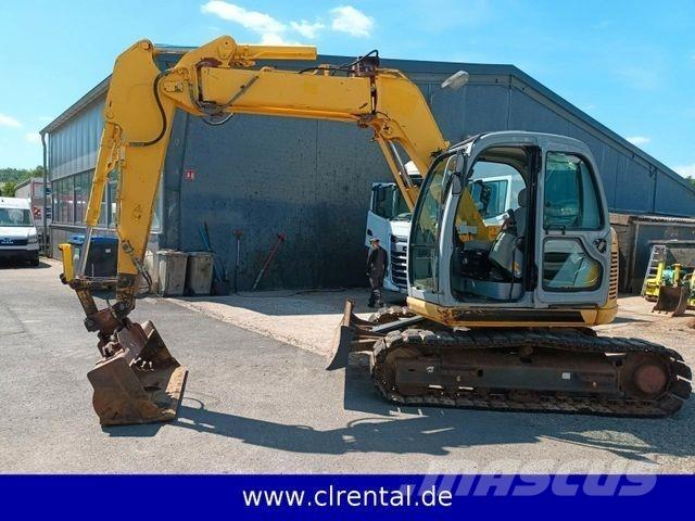 New Holland E70SR 4 Tractopelle