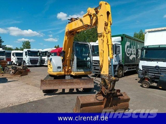 New Holland E70SR 4 Tractopelle