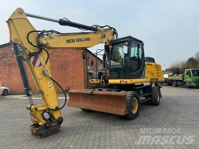 New Holland WE210 Pelle sur pneus