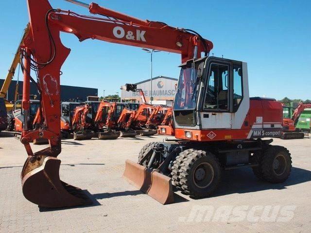 O&K MH 5 Compakt Pelle sur pneus