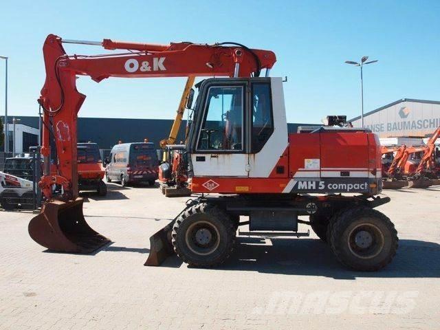 O&K MH 5 Compakt Pelle sur pneus