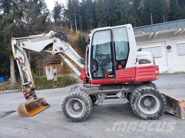 Takeuchi TB295W Pelle sur pneus
