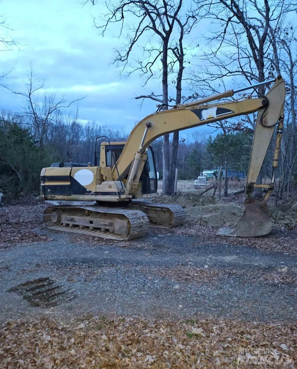 CAT 312B Pelle sur chenilles