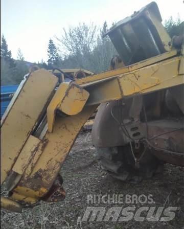 CAT 518 Débusqueur
