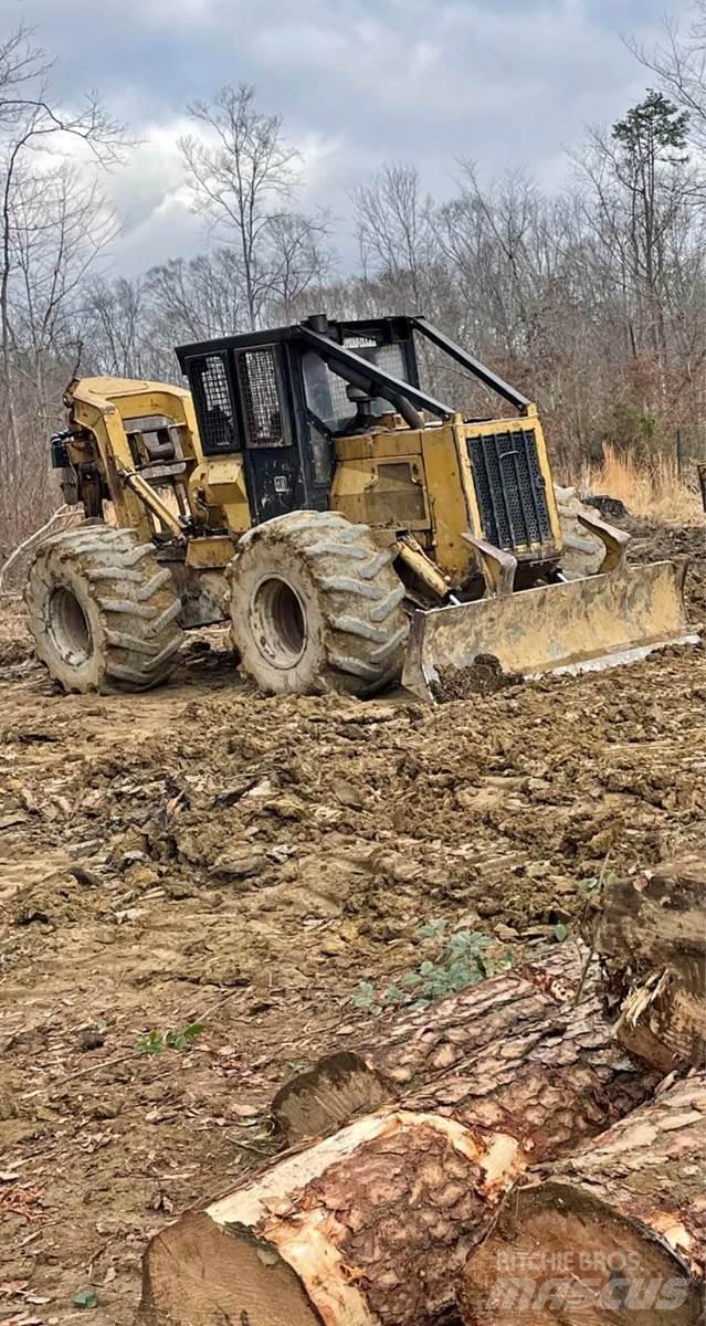 CAT 518C Débusqueur