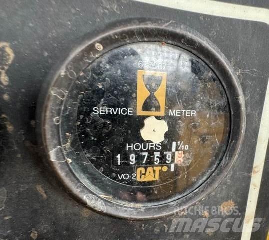 CAT 527 Débusqueur