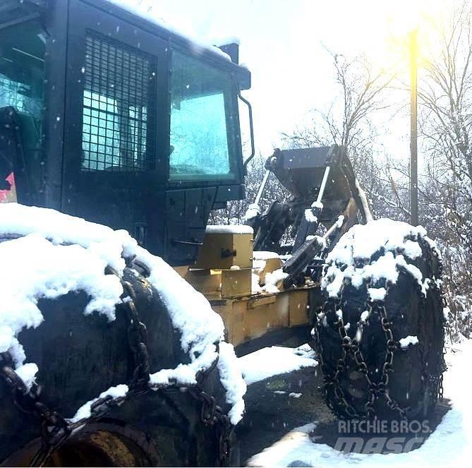 CAT 545C Débusqueur