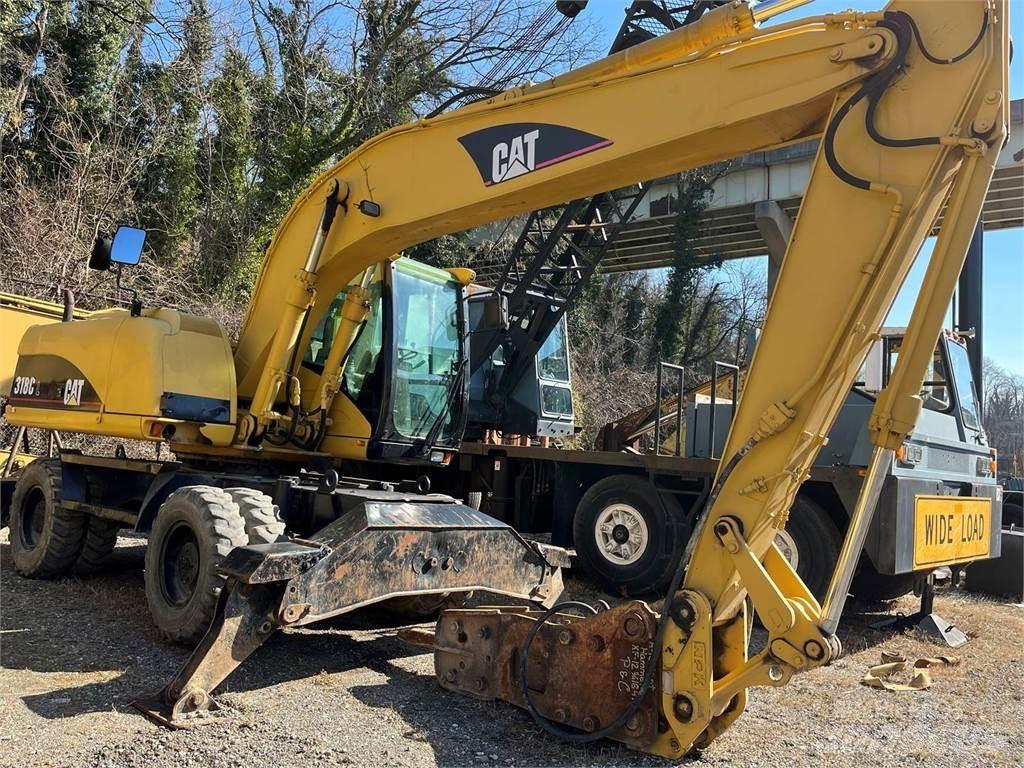 CAT M318C Pelle sur pneus