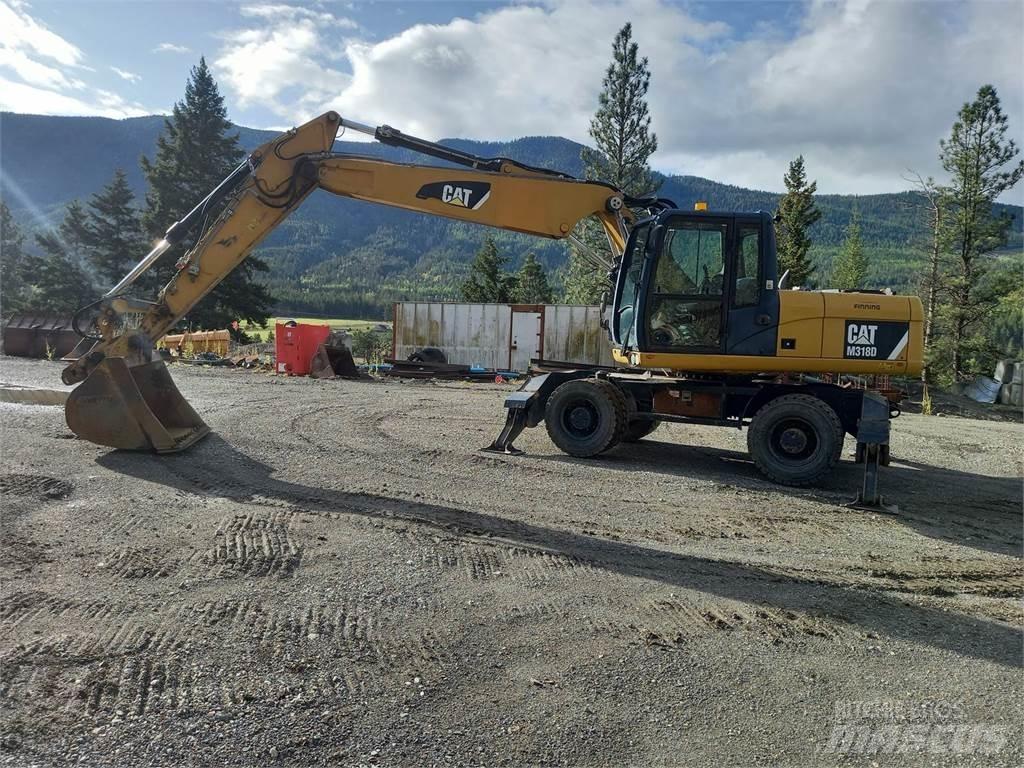 CAT M318D Pelle sur chenilles
