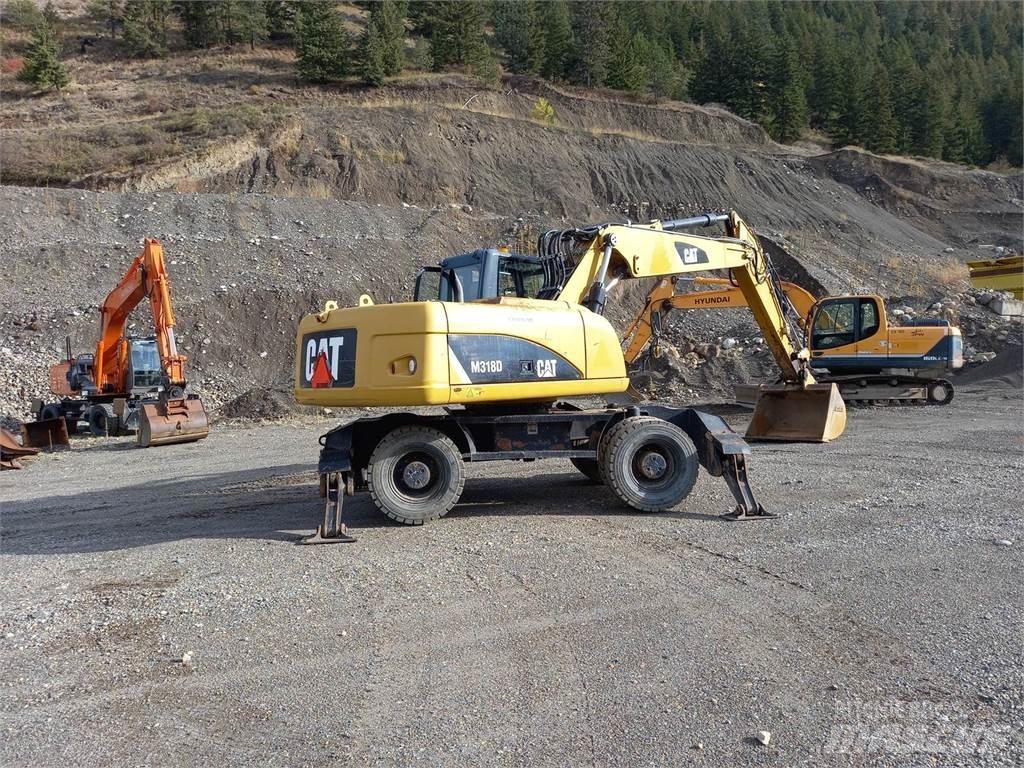 CAT M318D Pelle sur chenilles