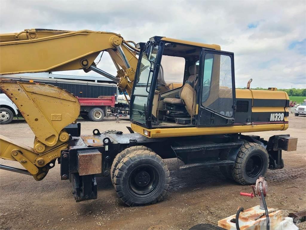 CAT M320 Pelle sur pneus