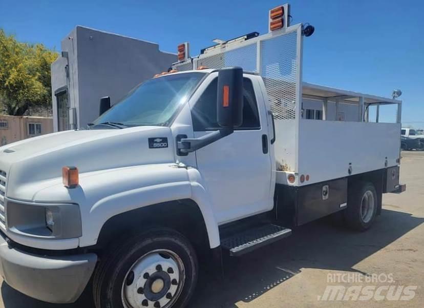 GMC 5500 Camion plateau ridelle avec grue