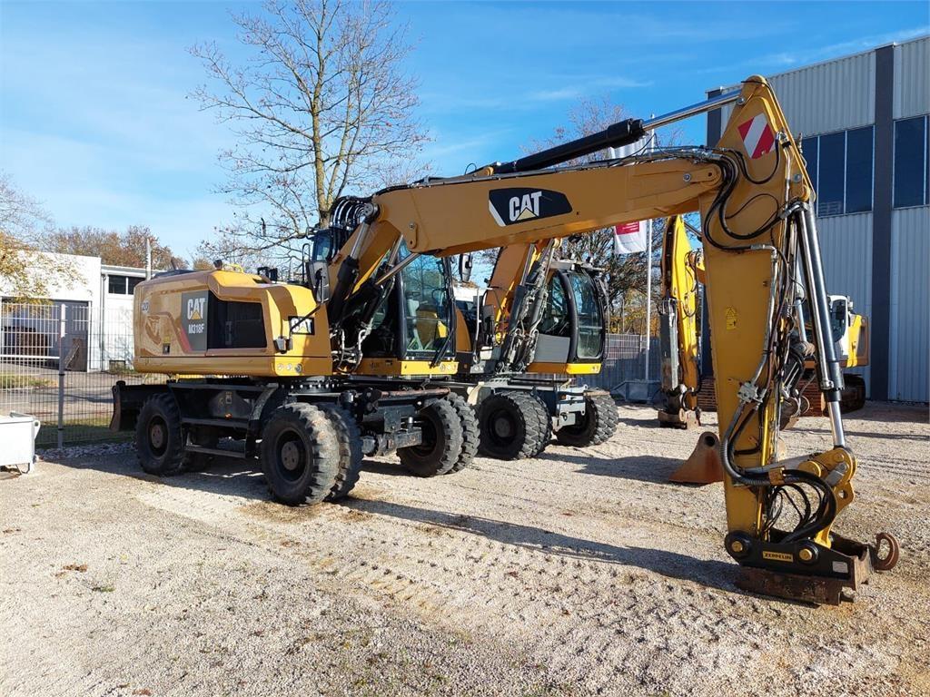 CAT M 318F Pelle sur pneus