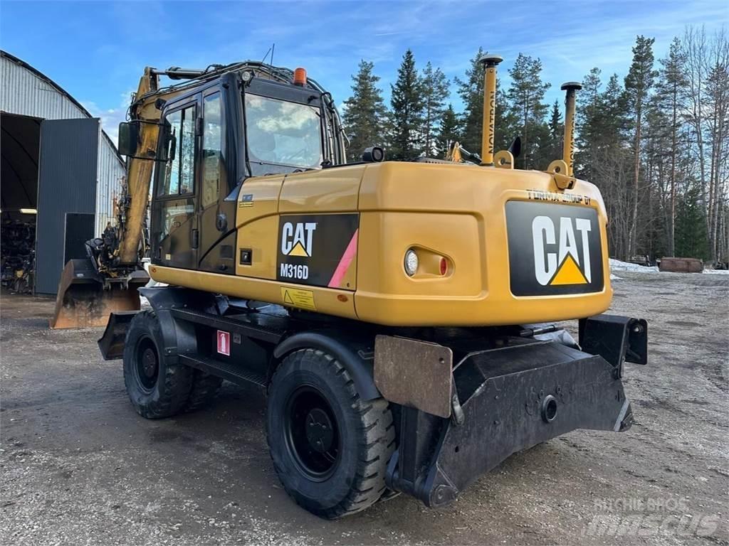 CAT M 316 D Pelle sur pneus