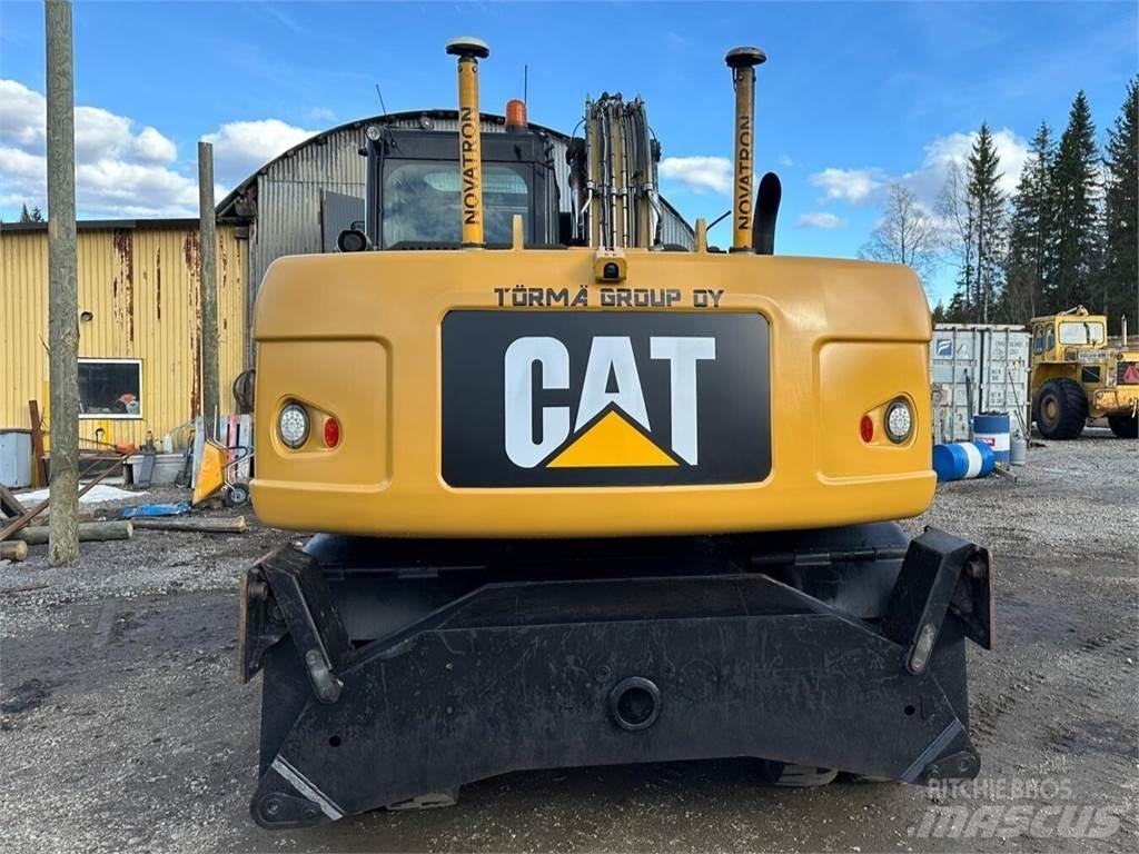 CAT M 316 D Pelle sur pneus