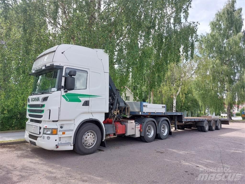 Scania r 560 Camion plateau ridelle avec grue