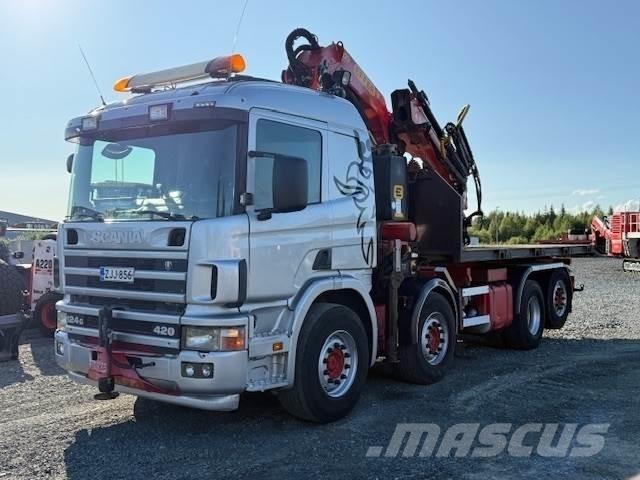 Scania R124G Camion plateau ridelle avec grue