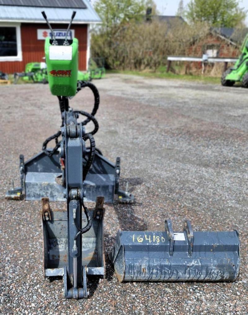 Avant Grävaggregat 210 Chargeuse compacte