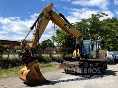 CAT M322D Pelle sur pneus