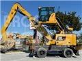 CAT MH3024 Pelle à déchets
