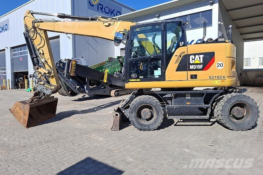 CAT M 315 F Pelle sur pneus