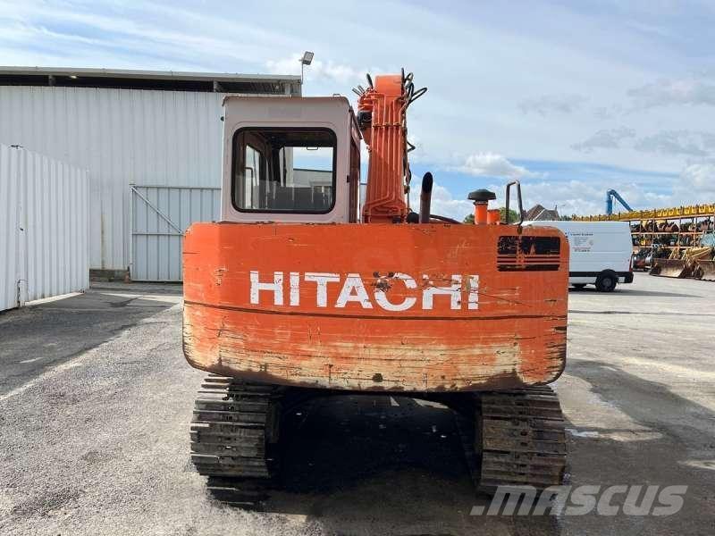 Hitachi EX60 Pelle sur chenilles