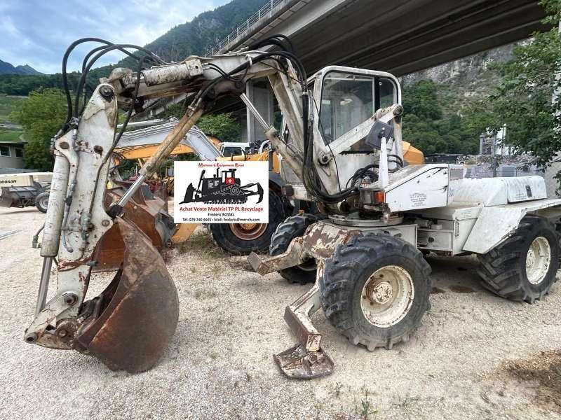 Mecalac 8CXI Pelle sur pneus