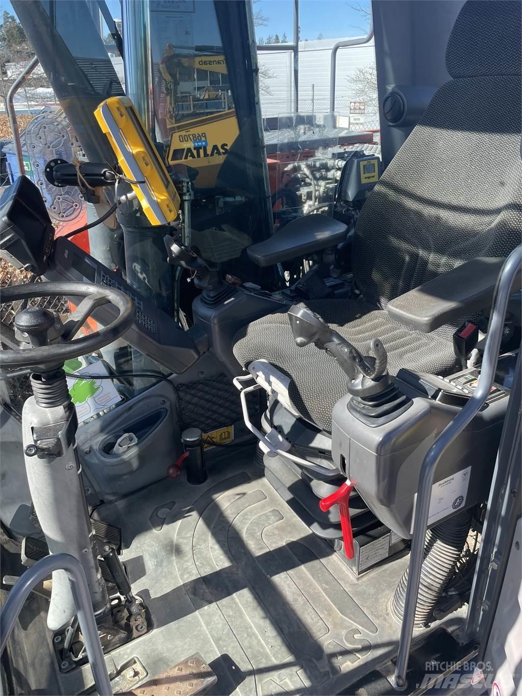 Atlas 140W Pelle sur pneus