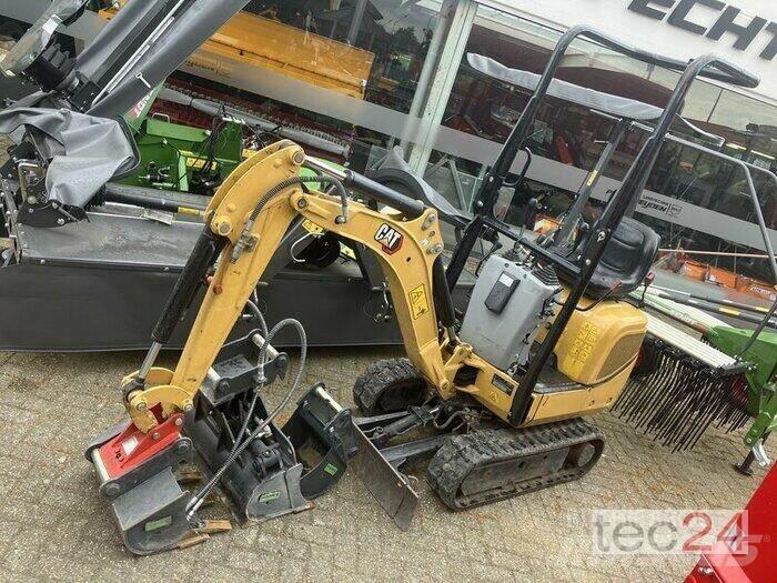 CAT 300.09D Pelle sur pneus