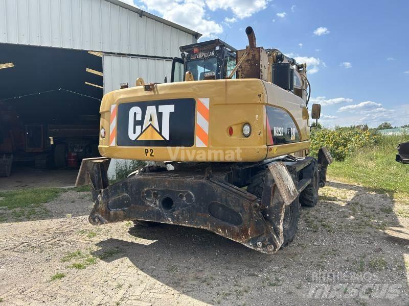 CAT M322D VAH Pelle sur pneus