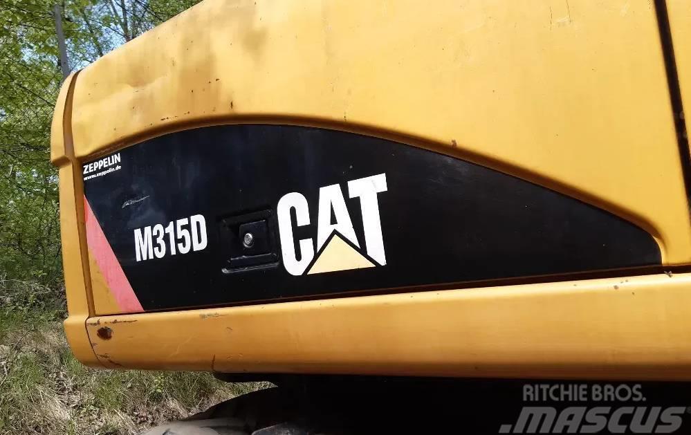 CAT M 315 D Pelle sur pneus
