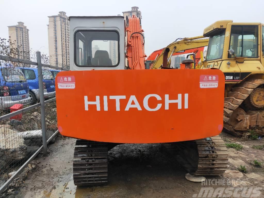 Hitachi EX 60 Pelle sur chenilles