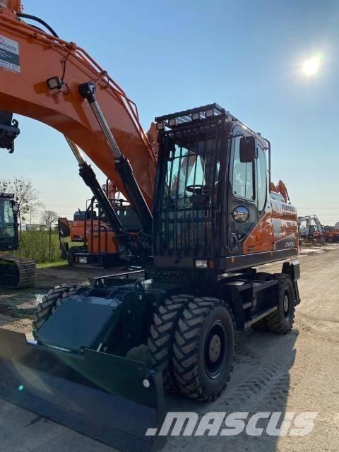 pelle Doosan sur pneus DX160 occasion année 2016 3800 heures flèche a