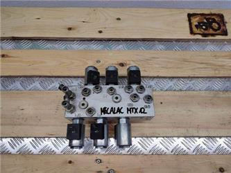 Mecalac MTX 12 (6090199 VMF) hydraulic block