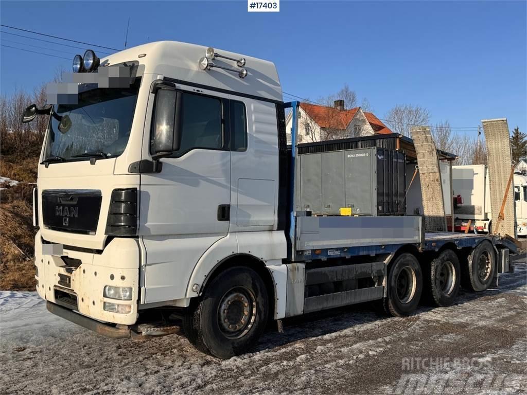 MAN TGX 35.480 8x4 flatbed truck w/ driving bridges Camion plateau