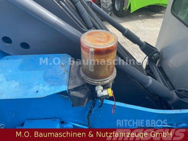 Fuchs MHL 320 / ZSA / AC / Hochfahrbare Kabine / Pelle sur pneus
