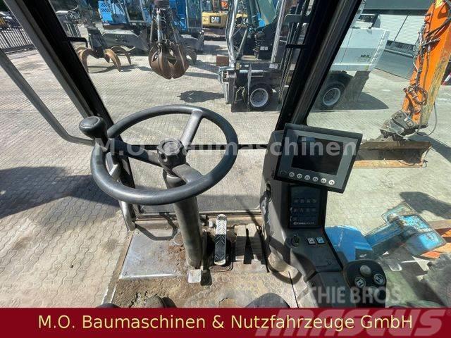 Fuchs MHL 320/ZSA/Hochfahrbare Kabine/ Pelle sur pneus
