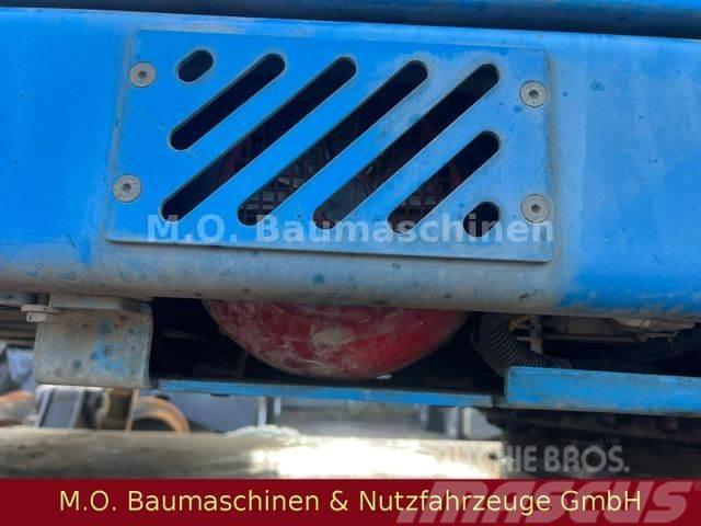 Fuchs MHL 331 / ZSA / AC / Hochfahrbare Kabine /Magnet Pelle sur pneus