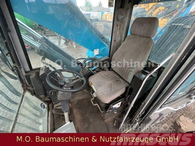 Fuchs MHL 331 / ZSA / AC / Hochfahrbare Kabine / Pelle sur pneus