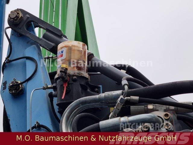 Fuchs MHL 340 / Hochfahr.Kabine/Stiel mit Zylinder Pelle sur pneus