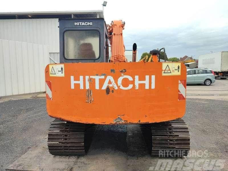 Hitachi EX60 Pelle sur chenilles