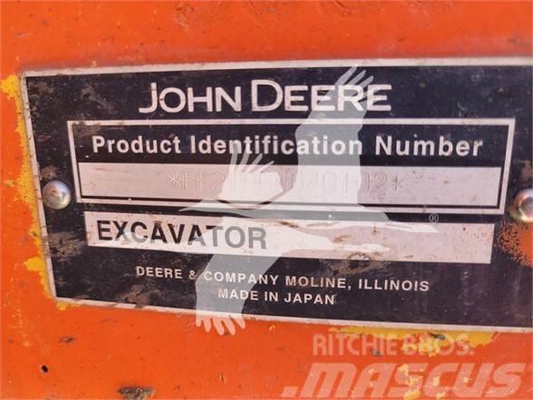 John Deere 210C W Pelle sur pneus