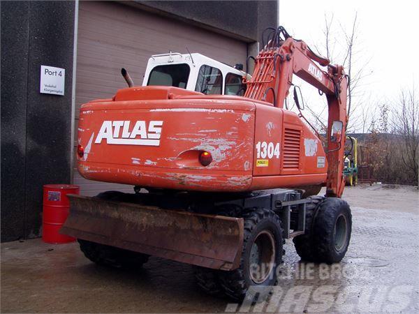 Atlas 1304M Pelle sur pneus